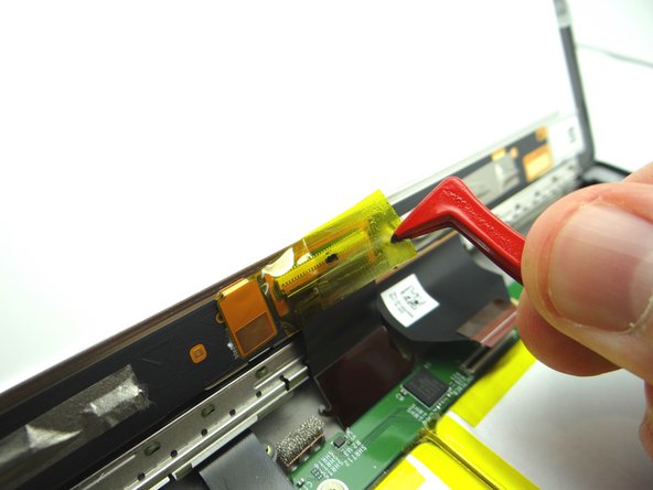 Picture 1: Peel up yellow Kapton tape with plastic tweezers. Adhere the tape to the wall of COMPARTMENT A.