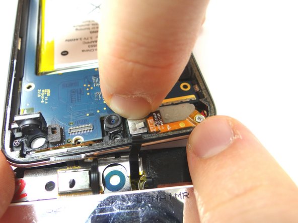 Picture 2: Push down on the logic board to seat the digitizer ribbon connector.