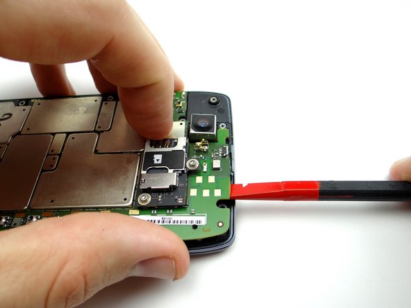 Picture 1: Pry up the top edge slightly.