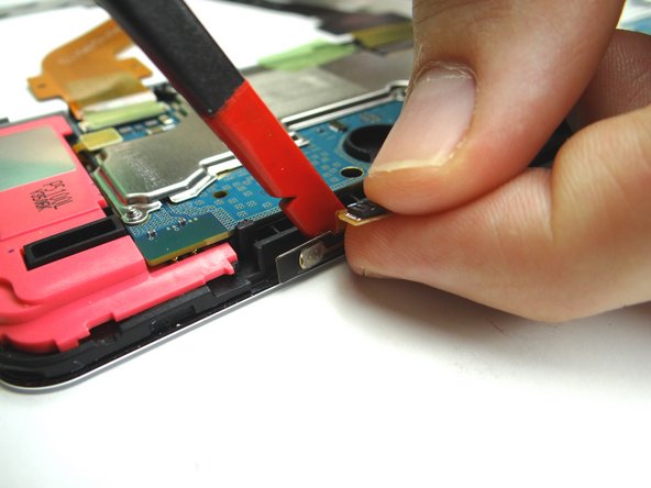 Adhesive holds the power &amp; volume buttons cable in place: