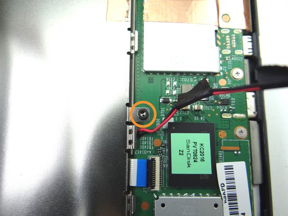 Picture 3: Remove four 2.2 mm #00 Phillips screws.  Place in SLOT 2.