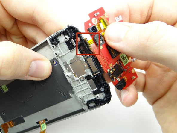 Pictures 1 &amp; 2: While holding the front panel in your left hand, use your right hand to rotate the upper board away from the front panel to expose the power button cable (red square).  Carefully peel up the power button cable with your fingers.