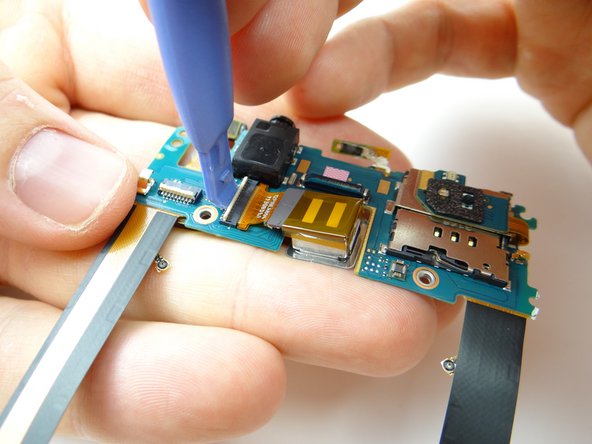 Picture 2: Use blue pry tool to open ZIF connector.