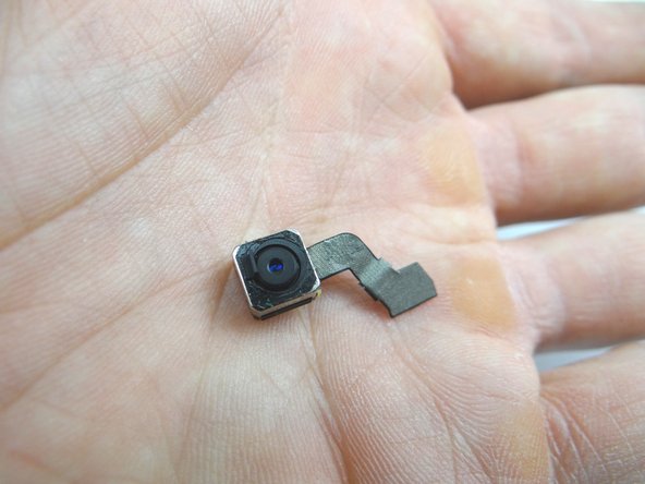 From COMPARTMENT B, seat the camera in its socket on the rear case.