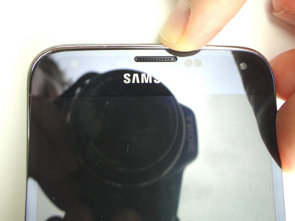 Picture 1: Line up the top edge of the screen with the mid-frame, noting the earpiece speaker opening, but DO NOT CLOSE THE SCREEN.