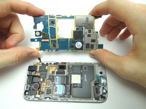 Bring logic board and front panel together at a 45° angle.  Push display cable firmly into place.