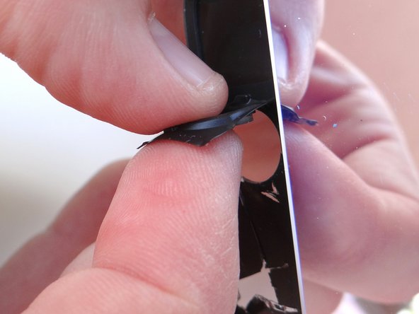 Picture 2: Peel away home button and place in COMPARTMENT B.