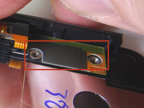 Picture 2: Make sure the openings for the screw slots on the cable line up with the slots on the front panel.