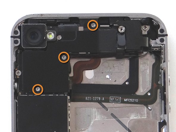 Picture 2: Remove one 1.5 mm Phillips screw.  Place in SLOT 4.