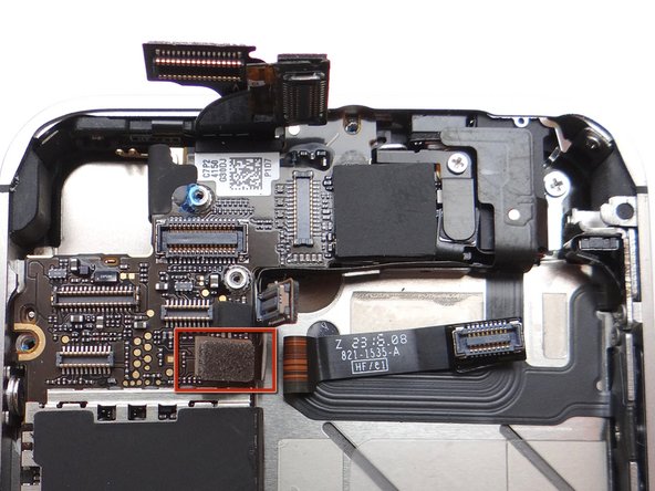 Picture 1: Reconnect the power button cable to its socket on the logic board.  (Cable head is outlined in red - socket is directly beneath).