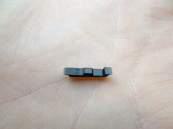 Picture 3: The power button will fall out as you're removing the mid-body.  Place it in COMPARTMENT B.