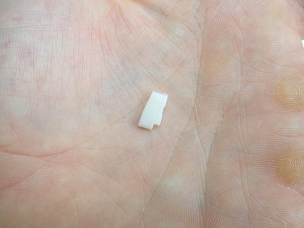 Remove the rubber gasket with your fingers and place it in COMPARTMENT D.