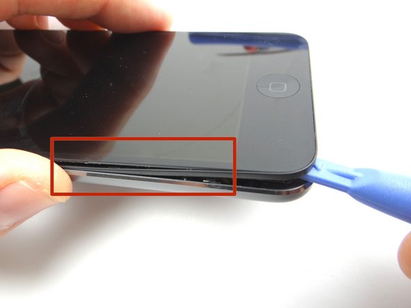 Picture 2: Pry up just enough to wedge blue pry tool and remove the iSesamo.