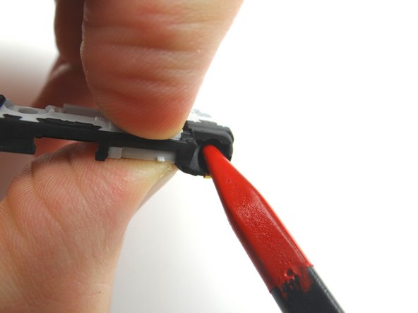 Retrieve the antenna bracket from COMPARTMENT E.  Remove the headset jack from the antenna bracket: