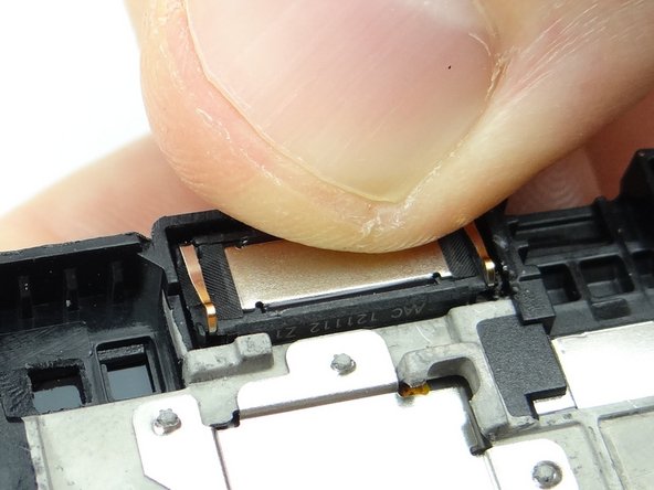 The close-up better illustrates the orientation of the speaker.