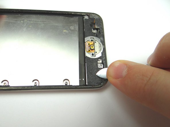 Remove adhesive and glass shards (if any) from rear case.
