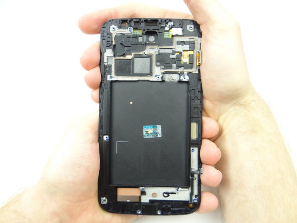 Quickly place the IMEI sticker on the replacement display and smooth it out.
