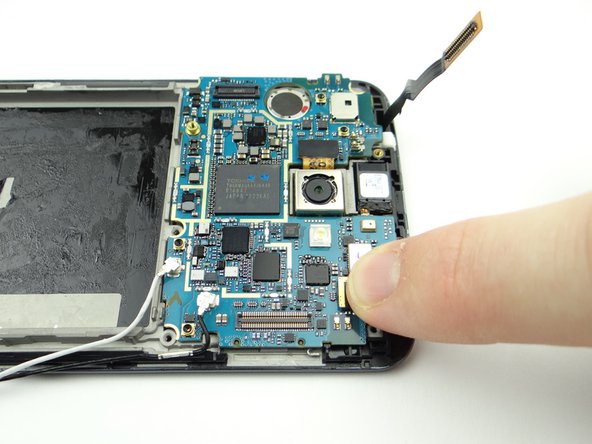 Place it in the socket and connect the cable.