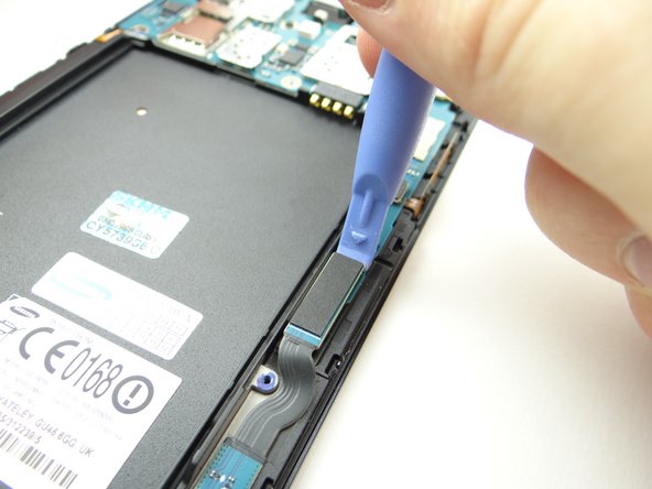 Disconnect soft keys cable.