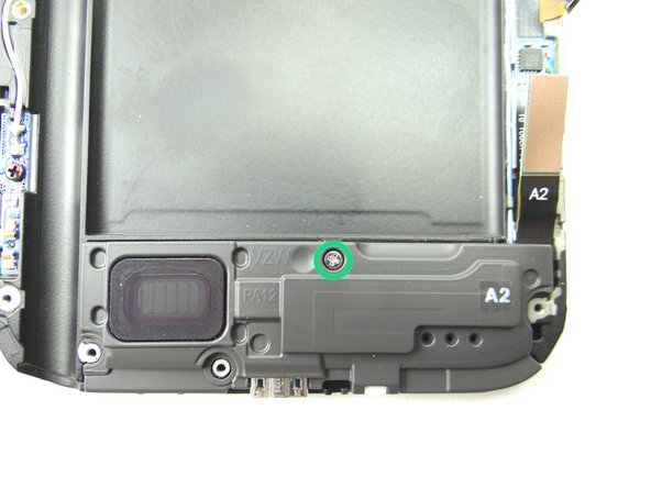 Use the #00 Phillips Screwdriver to unscrew the one 2.0 mm screw, it will likely not come out. It will go into COMPARTMENT F with the loudspeaker.