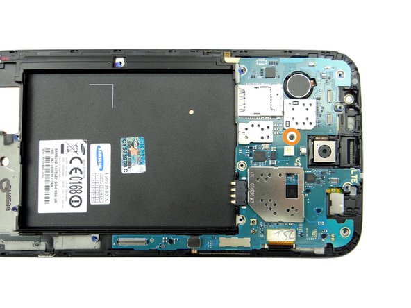 Picture 1: Remove one 2.4 mm #00 Phillips screw.  Place in SLOT 2.