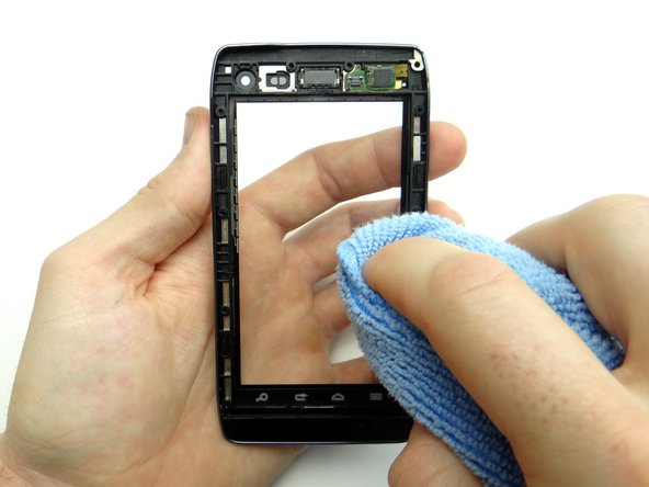 Pictures 1 &amp; 2: If you're reusing the digitizer, clean it with a chamois cloth and compressed air.