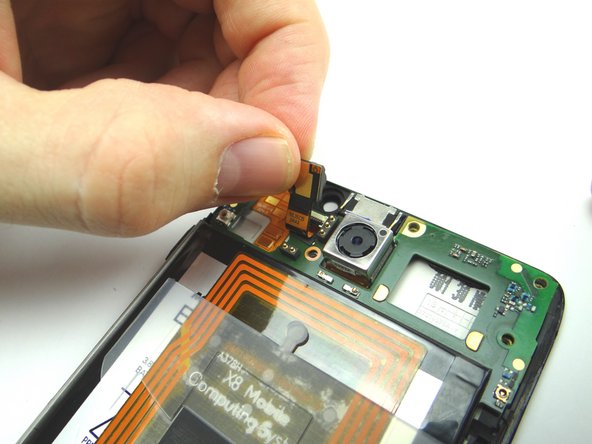 Push front-facing camera back into its socket.