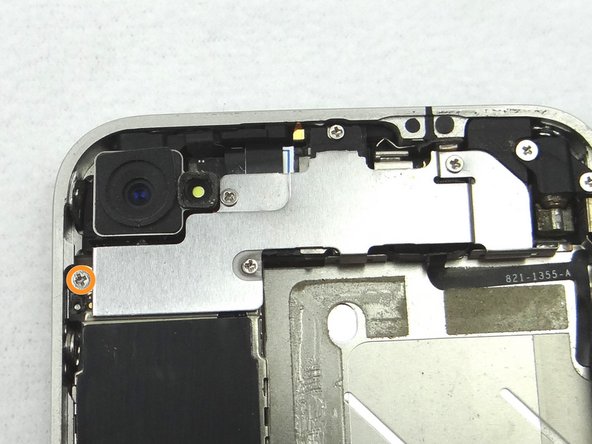 Picture 1: Remove the 2.3 mm Phillips screw and place in SLOT 3.