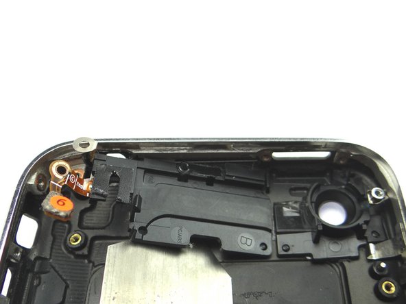 Use iSesamo to pry up antenna labelled '6' just enough to continue removing it with your fingers.