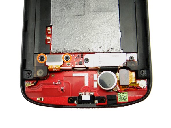 Replace two 1.7 mm #00 Phillips screws from SLOT 2 to secure battery connector.