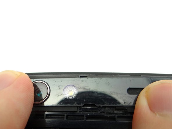 If the trim is loose, try heating the area to reactivate the adhesive.  Apply pressure until the trim is secure.  (If necessary, apply thin strips of double-sided adhesive to secure the trim.)