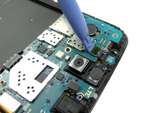 Disconnect infrared sensor / earpiece speaker assembly with blue pry tool.