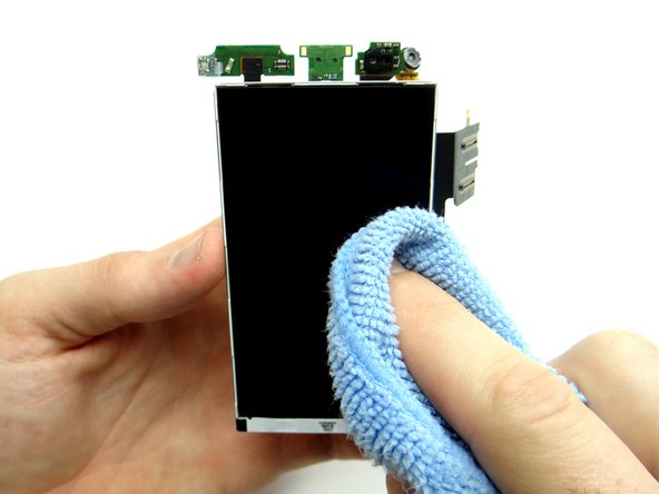 If you're reusing the LCD, clean it with a chamois cloth and compressed air.