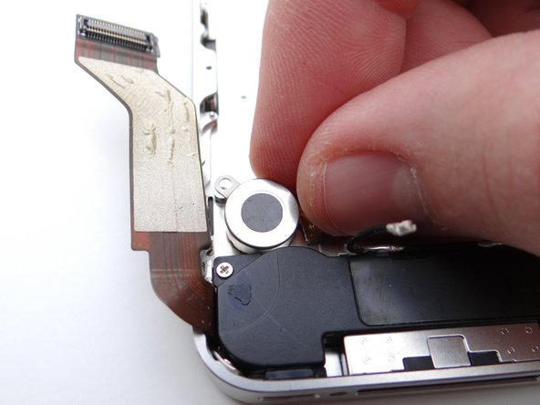 Use your fingers to replace the vibrator from COMPARTMENT D (or replacement part).