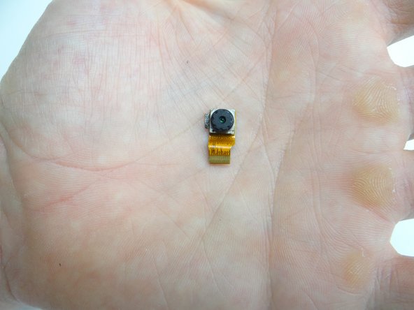 Picture 1: From COMPARTMENT C, replace front-facing camera.