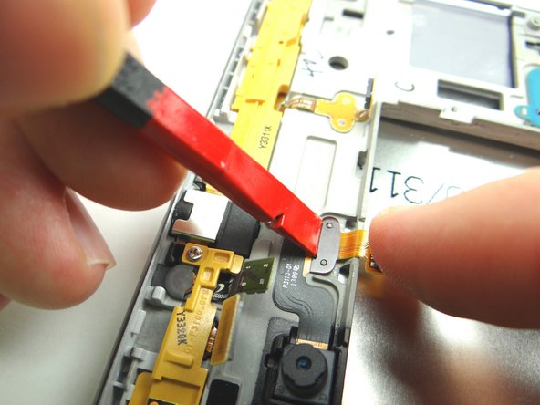 Make sure holes in cable are placed over tabs on front panel.