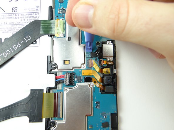 Use blue pry tool to disconnect headset jack cable.