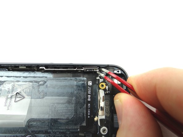 Picture 1: Use Curved Tip Tweezers to move the mute button out of position.