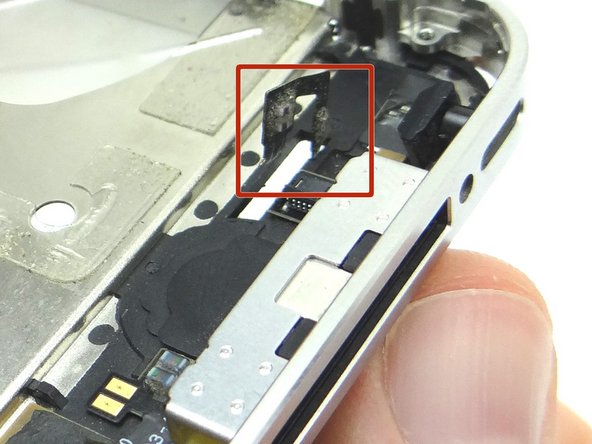 Picture 3: Carefully pull the home button assembly through the mid-frame.