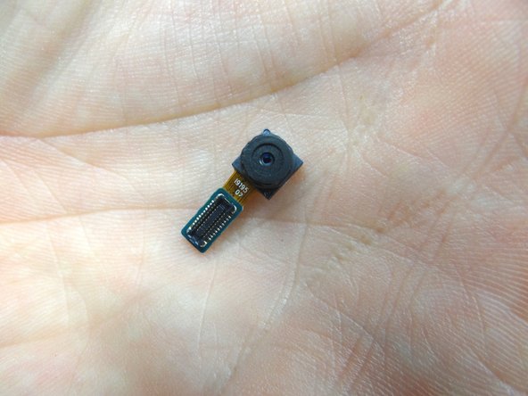 From COMPARTMENT C, seat front-facing camera with your fingers.