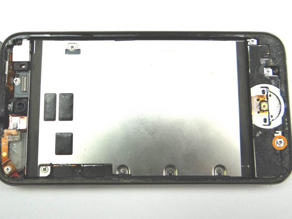 Picture 3: Remove one 3.5 mm Phillips screw and place into SLOT 3.