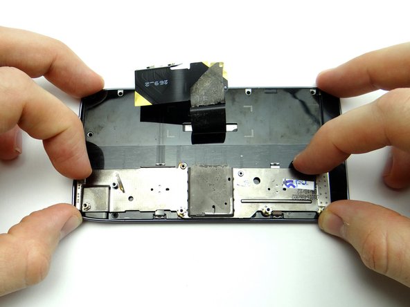 Move sliding bracket back down, out of the way of the display cable.