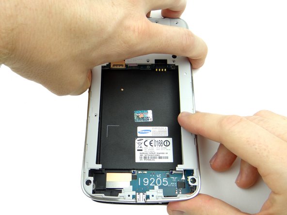 Picture 3: Gently peel the mid-frame away from the front panel.  Place mid-frame in ZONE V.