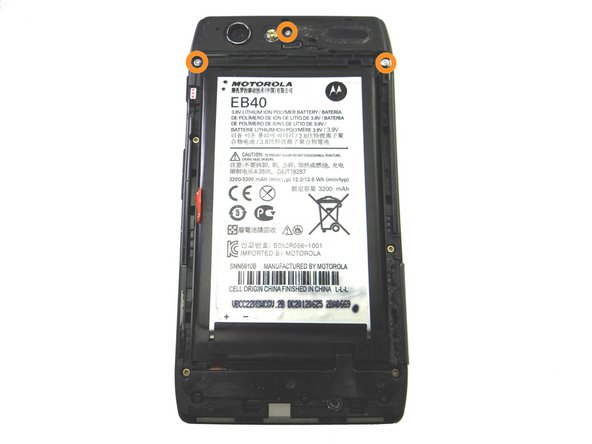 Remove three 6.7 mm silver T3 Torx screws and place into SLOT 1.