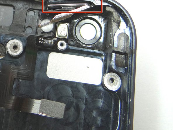 Picture 1: Replace the power button from COMPARTMENT F.  Make sure the hinge is at the top of the button and closed.  Align power button contact.