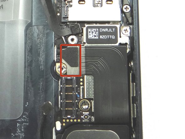 Picture 2: Reseat the charging port assembly cable.