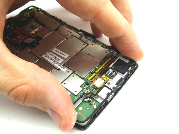 Seat the gray antenna bracket: snap the two clips at top into place.  Snap the clips on either side of the antenna bracket into place.