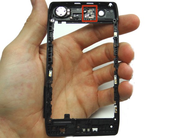 Picture 1: The camera flash is attached to the mid-frame.