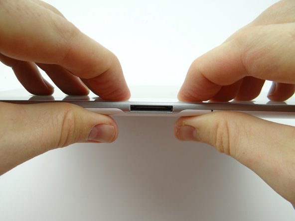 Picture 1: Press charging port clips into place.