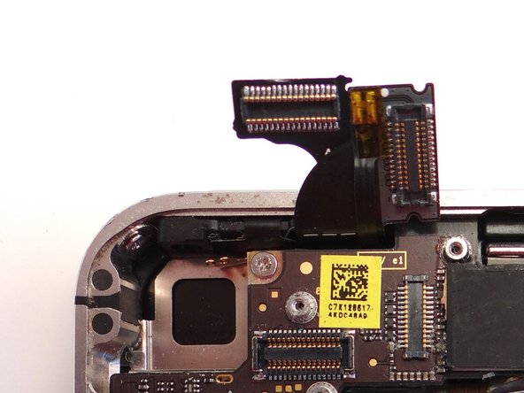 Replace camera from COMPARTMENT B.  Push connector into socket on logic board.